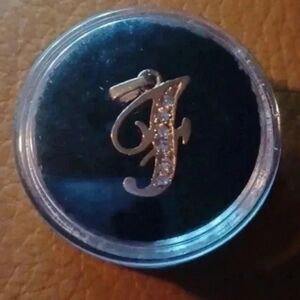 Gold plated letter pendant "F" with faux diamonds